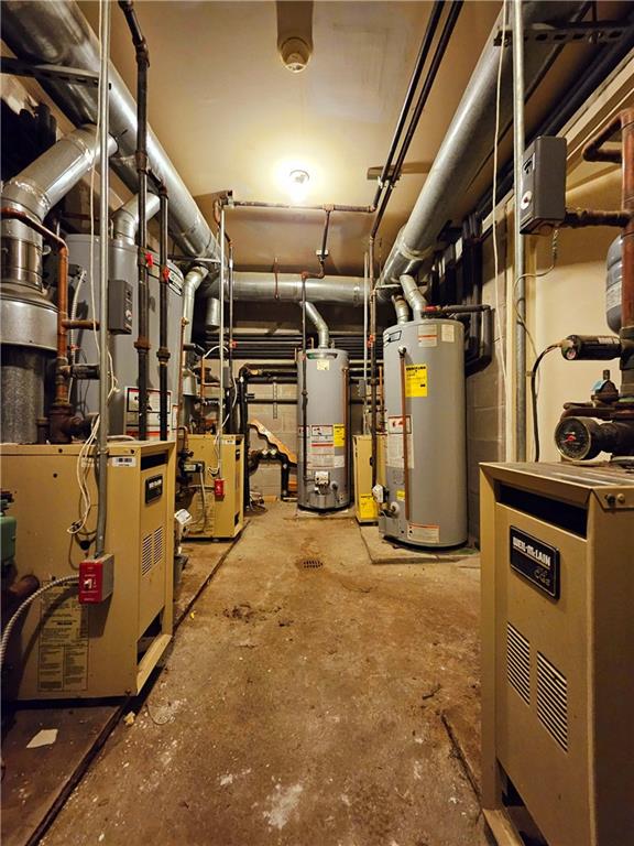 1820 73rd St Unit 1A, Brooklyn, NY 11214 - utility room featuring gas water heater and a heating unit