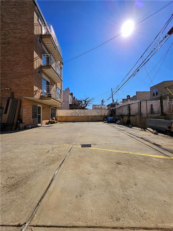 1820 73rd St Unit 1A, Brooklyn, NY 11214 - view of uncovered parking lot