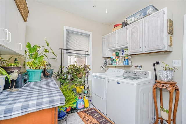 laundry room featuring cabinet space and independent washer and dryer