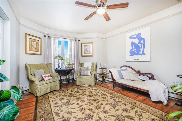 bedroom featuring a ceiling fan and wood finished floors