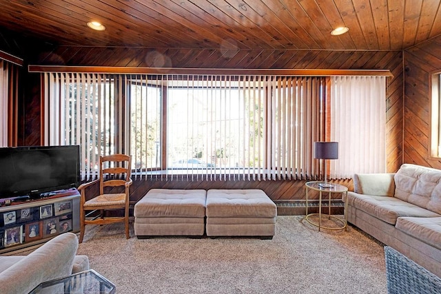 living room featuring recessed lighting, wood ceiling, and wood walls