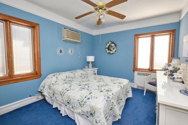 carpeted bedroom featuring baseboards, radiator, an AC wall unit, and ceiling fan