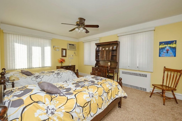 bedroom featuring baseboards, carpet floors, radiator heating unit, and a wall mounted AC