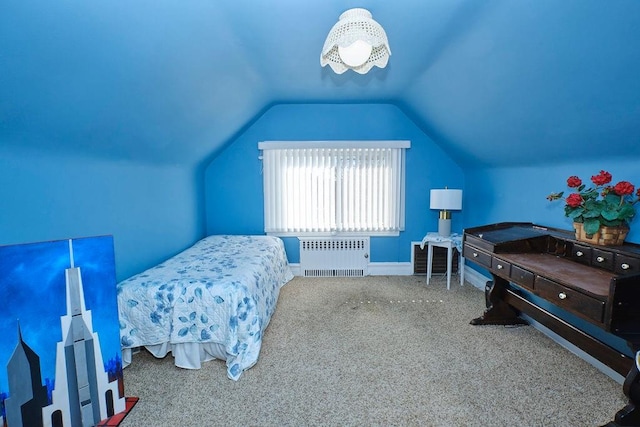 carpeted bedroom featuring radiator and lofted ceiling