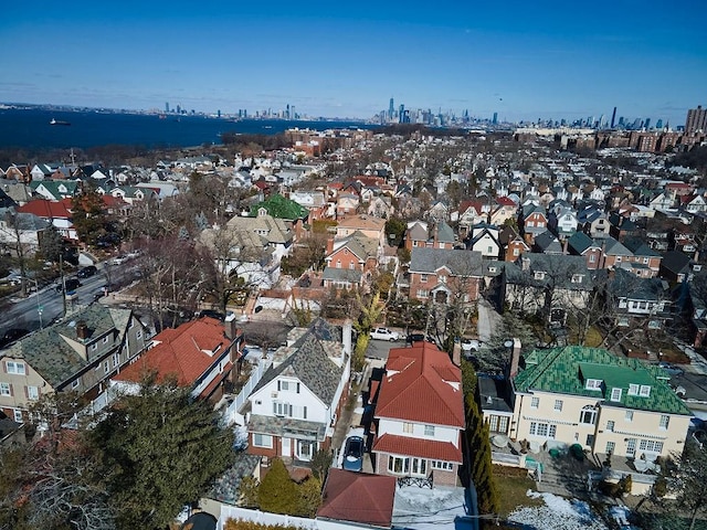 birds eye view of property with a residential view