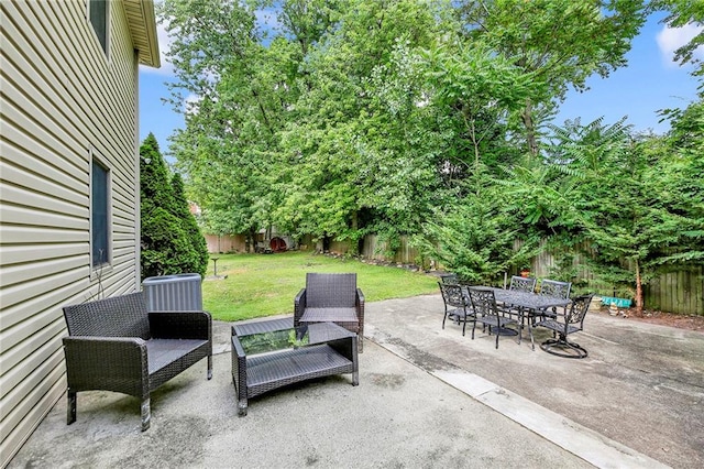 view of patio / terrace featuring outdoor dining area and a fenced backyard