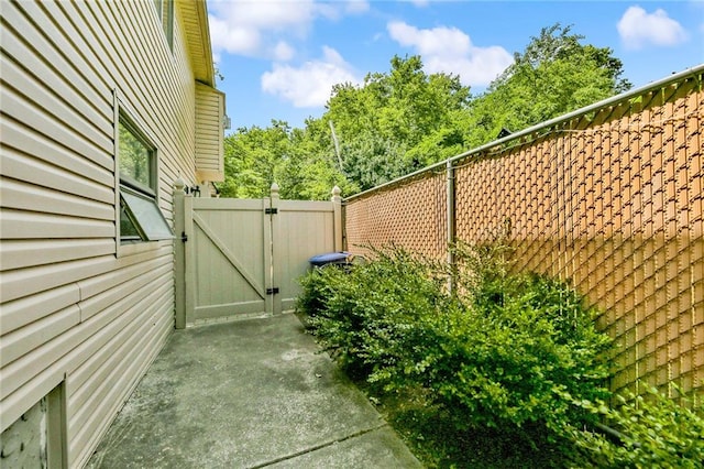 exterior space featuring a gate and fence