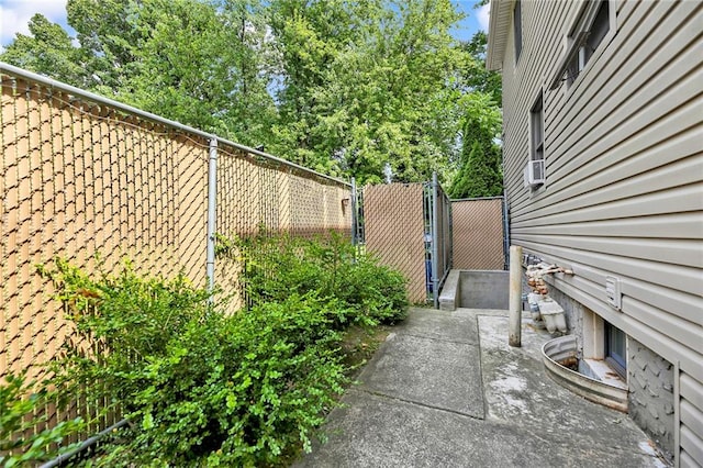 view of home's exterior featuring fence