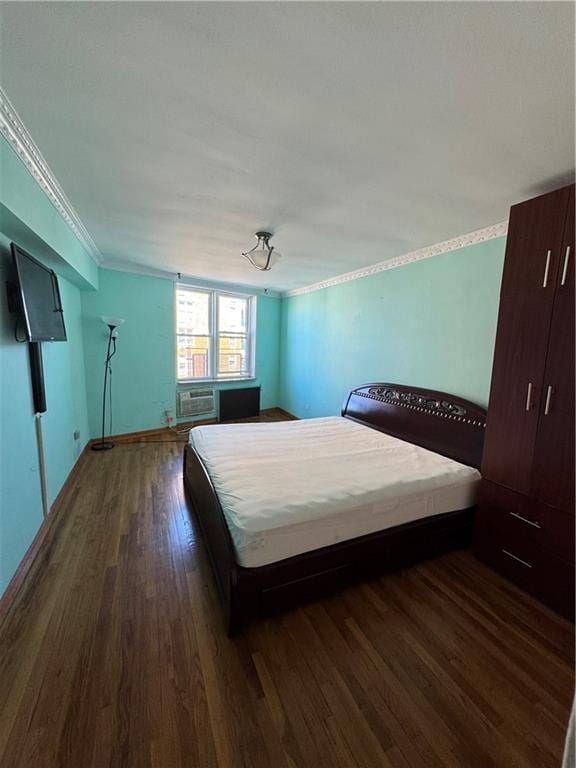 2610 Ocean Pkwy Unit 2D, Brooklyn, NY 11235 - bedroom with ornamental molding, dark wood-style flooring, and baseboards