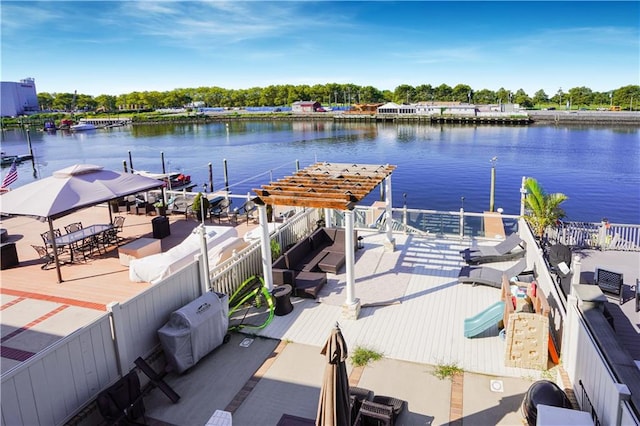 dock area featuring a water view