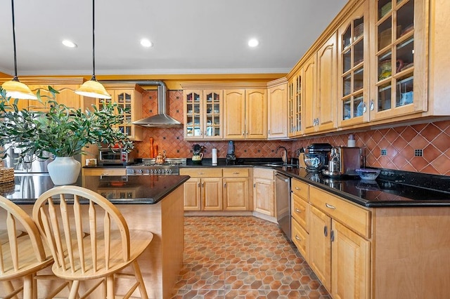 kitchen featuring a sink, stainless steel dishwasher, a breakfast bar area, wall chimney range hood, and range