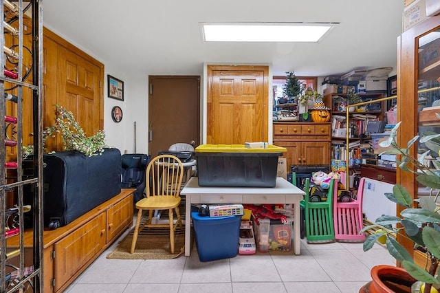 interior space with light tile patterned floors