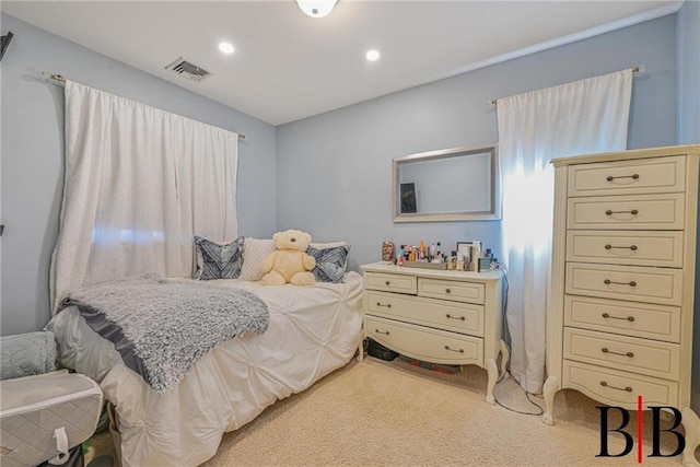 bedroom with recessed lighting, visible vents, and light carpet