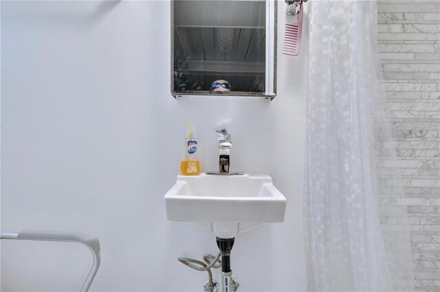 2622 Fillmore Ave, Brooklyn, NY 11229 - full bath featuring a shower with shower curtain