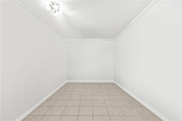 interior space with light tile patterned floors and baseboards