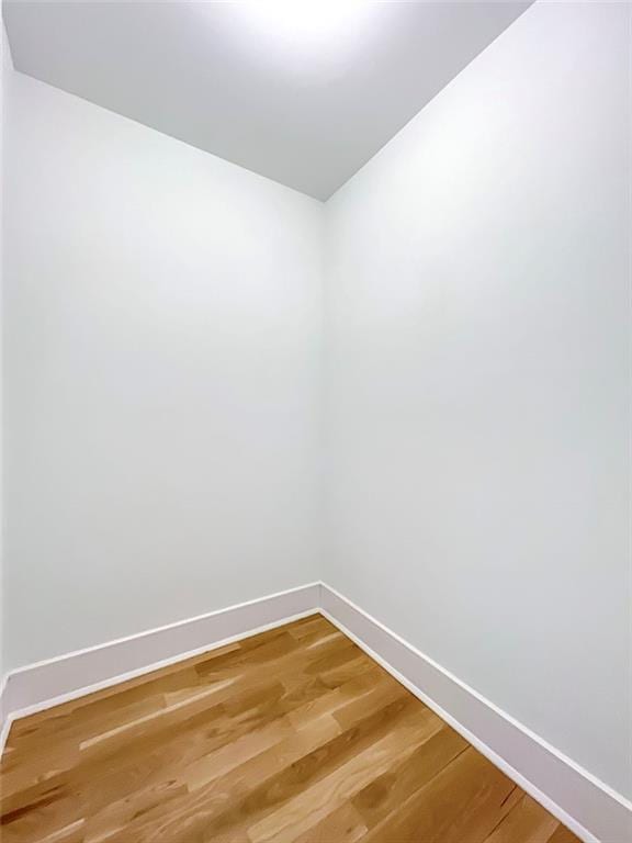 859 Lamont Ave, Staten Island, NY 10309 - empty room with baseboards and light wood finished floors