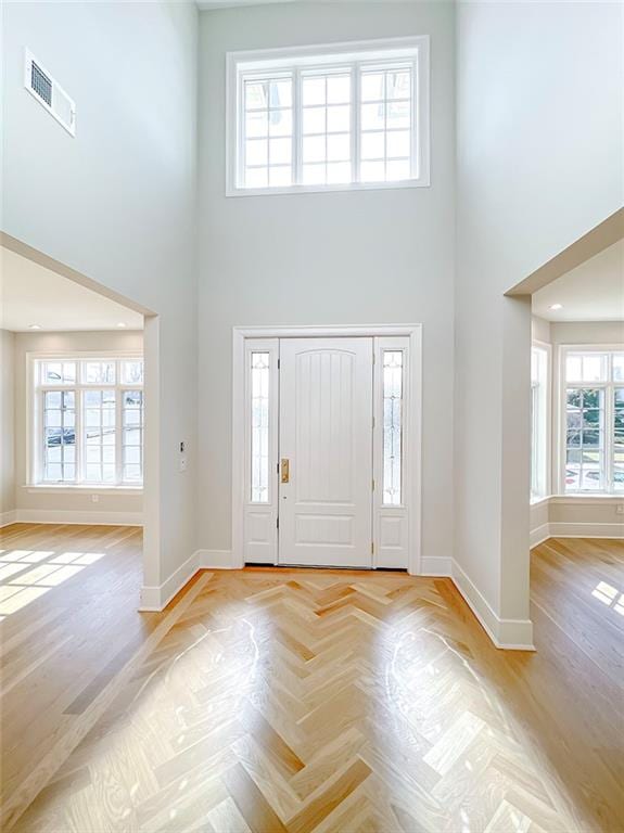 859 Lamont Ave, Staten Island, NY 10309 - foyer entrance featuring a high ceiling and baseboards