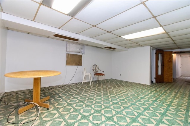 interior space featuring a paneled ceiling