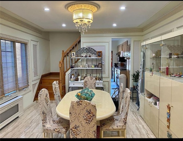 dining area with recessed lighting, ornamental molding, and stairs