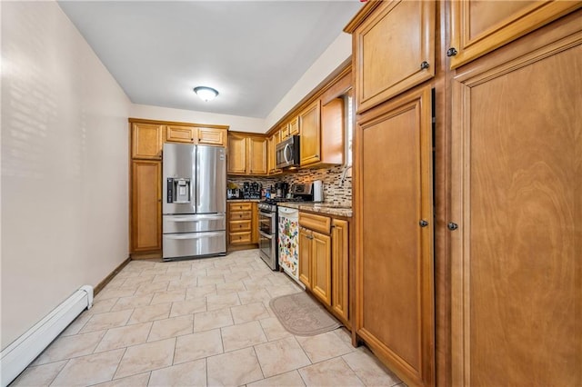 kitchen featuring light stone counters, brown cabinetry, stainless steel appliances, baseboard heating, and backsplash