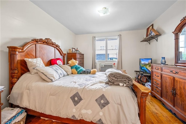 bedroom with light wood-style floors