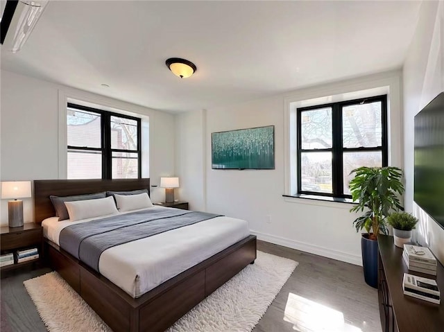 1307 84th St Unit 3C, Brooklyn, NY 11228 - bedroom featuring dark wood finished floors and baseboards