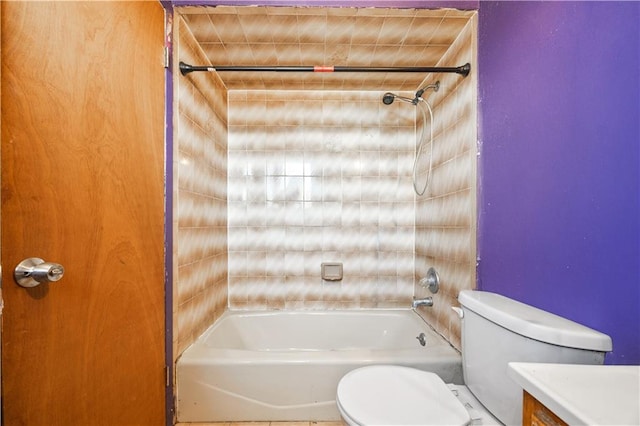 bathroom with toilet, vanity, and washtub / shower combination