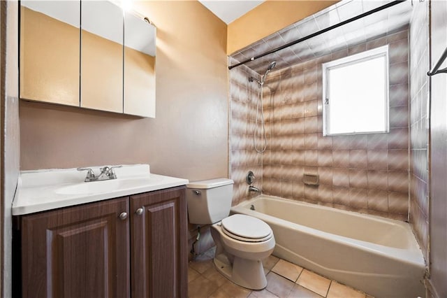 bathroom with tile patterned floors, vanity, toilet, and washtub / shower combination