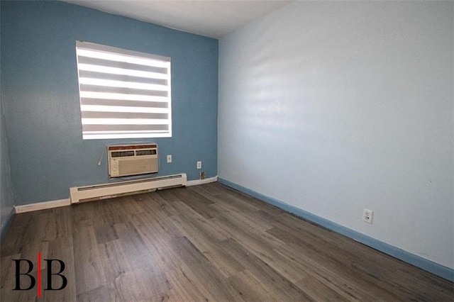 1121 E 73rd St Unit 69, Brooklyn, NY 11234 - empty room with a baseboard radiator, wood finished floors, baseboards, and a wall mounted air conditioner