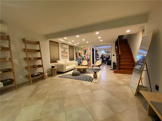 living room featuring a wall unit AC, stairway, light tile patterned floors, and recessed lighting