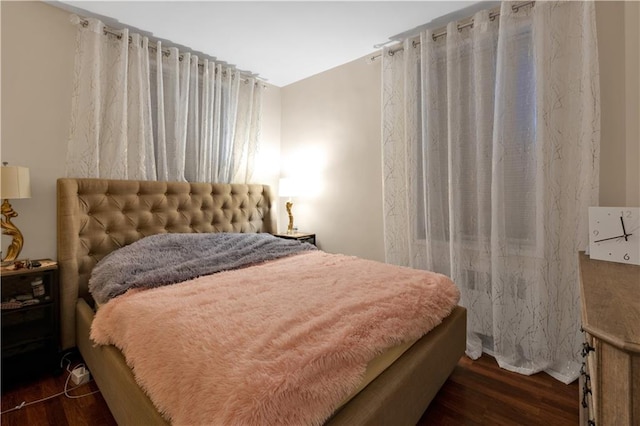 bedroom with wood finished floors