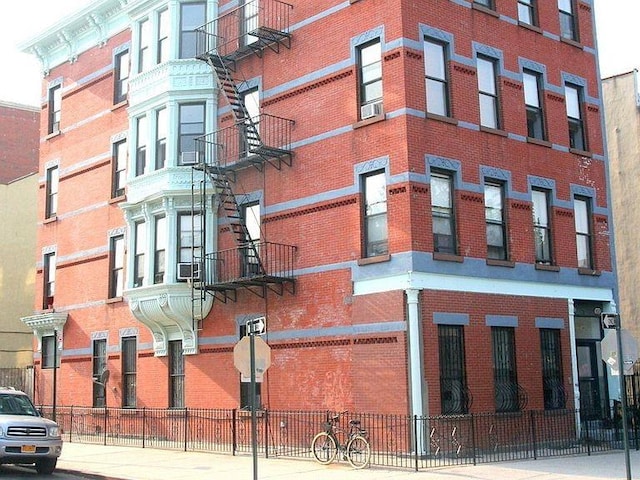 view of property featuring fence