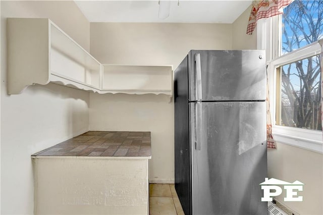 1722 E 55th St Unit 35F, Brooklyn, NY 11234 - kitchen with freestanding refrigerator and tile patterned floors