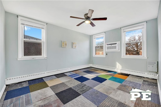 1722 E 55th St Unit 35F, Brooklyn, NY 11234 - spare room with a wall mounted air conditioner, a ceiling fan, and baseboards