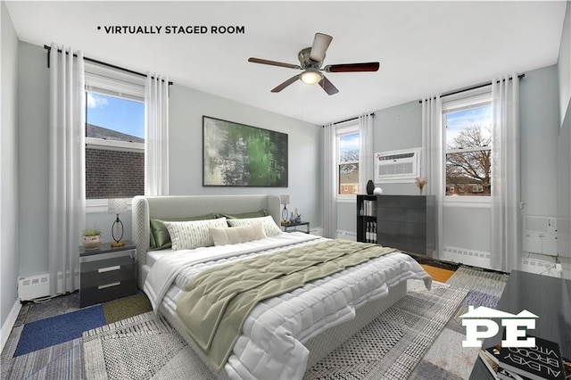 1722 E 55th St Unit 35F, Brooklyn, NY 11234 - bedroom featuring baseboards, a wall mounted air conditioner, and a ceiling fan