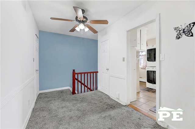 1722 E 55th St Unit 35F, Brooklyn, NY 11234 - carpeted empty room with a ceiling fan and baseboards