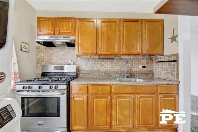 1722 E 55th St Unit 35F, Brooklyn, NY 11234 - kitchen with gas stove, under cabinet range hood, a sink, and light countertops