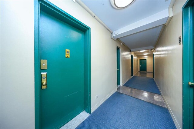 corridor with baseboards