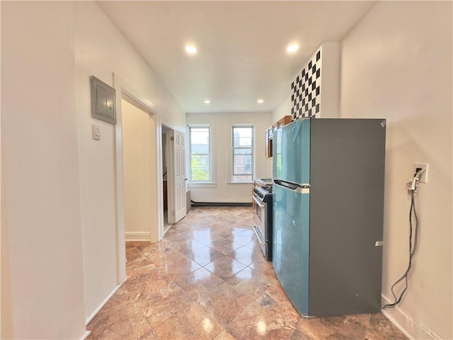 1708 Linden St, Ridgewood, NY 11385 - kitchen with appliances with stainless steel finishes and recessed lighting