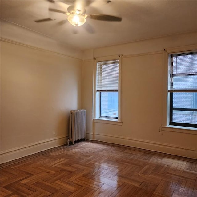 590 Parkside Ave Unit 2Be, Brooklyn, NY 11226 - spare room featuring radiator, ceiling fan, and baseboards