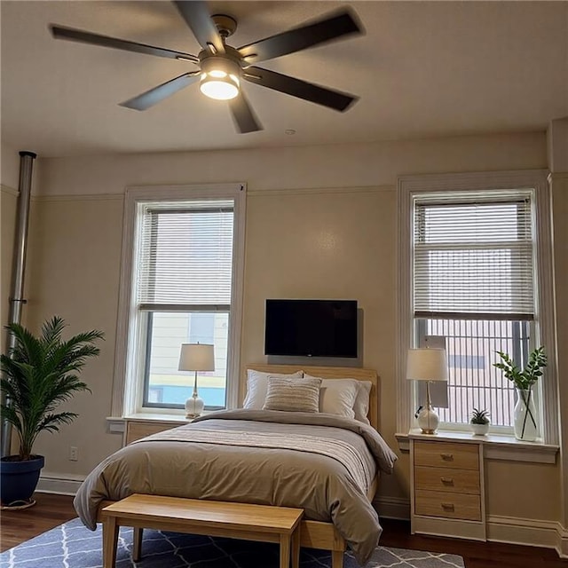 590 Parkside Ave Unit 2Be, Brooklyn, NY 11226 - bedroom featuring baseboards, dark wood finished floors, and a ceiling fan