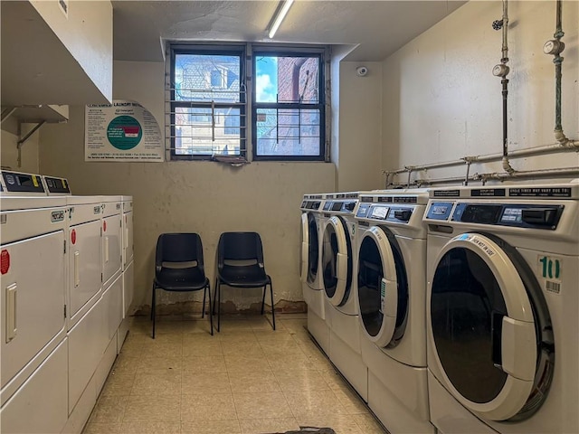 shared laundry area with washer and dryer