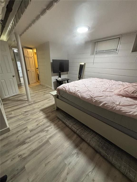 bedroom featuring light wood-type flooring