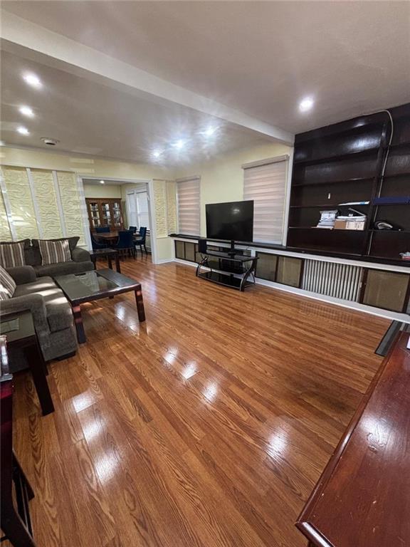 living room with wood finished floors