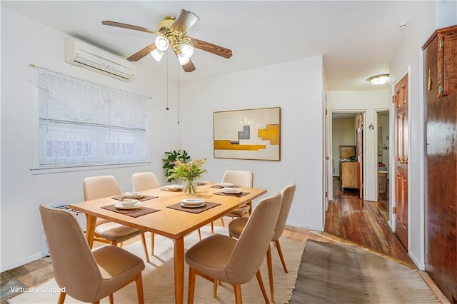 2121 Kimball St, Brooklyn, NY 11234 - dining area with a wall mounted AC, a ceiling fan, and light wood-type flooring