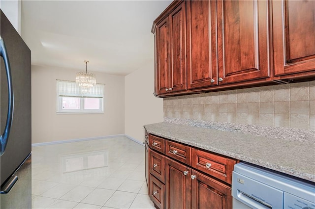2121 Kimball St, Brooklyn, NY 11234 - kitchen featuring freestanding refrigerator, dishwasher, backsplash, a chandelier, and baseboards
