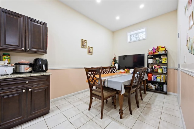 dining space featuring baseboards, recessed lighting, and light tile patterned floors