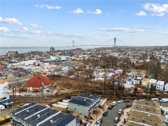 bird's eye view featuring a city view and a water view