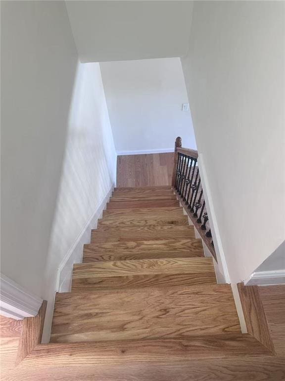 19 Drumgoole Rd, Staten Island, NY 10312 - stairway with wood finished floors