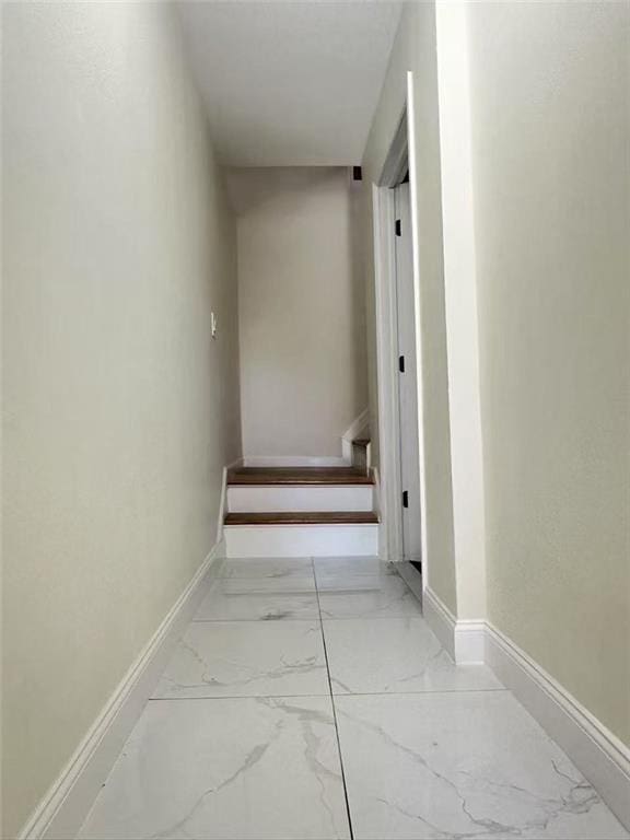 19 Drumgoole Rd, Staten Island, NY 10312 - staircase featuring marble finish flooring and baseboards